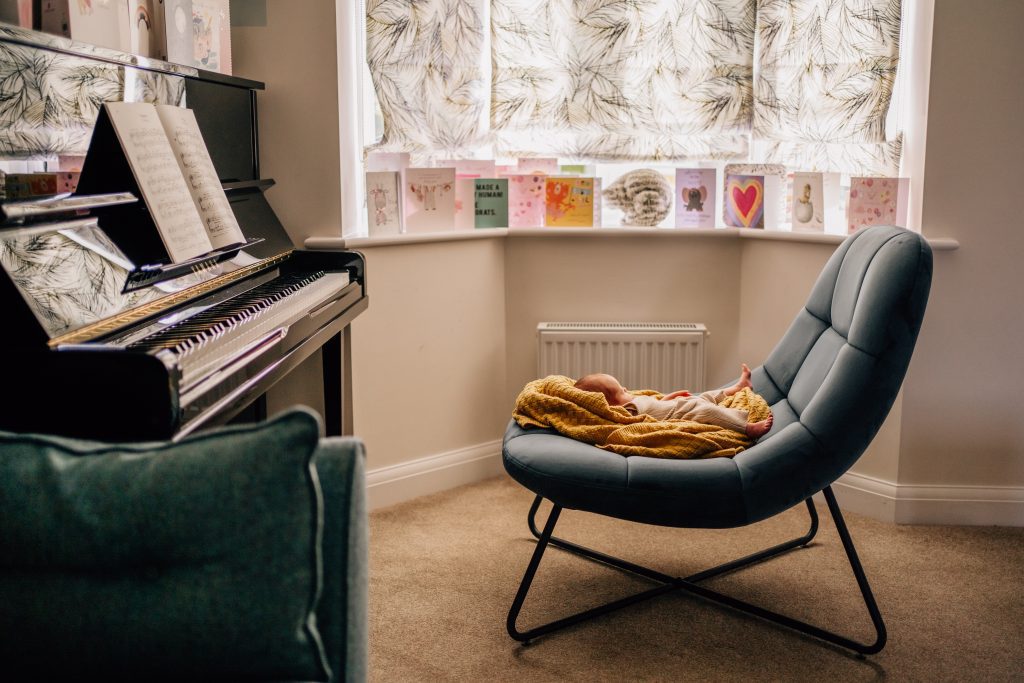 baby near piano